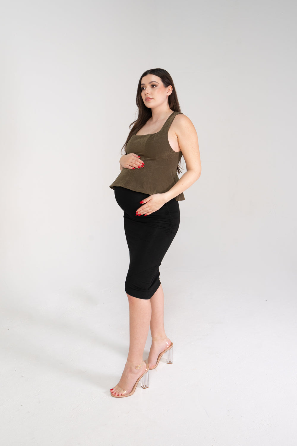 woman modeling maternity top